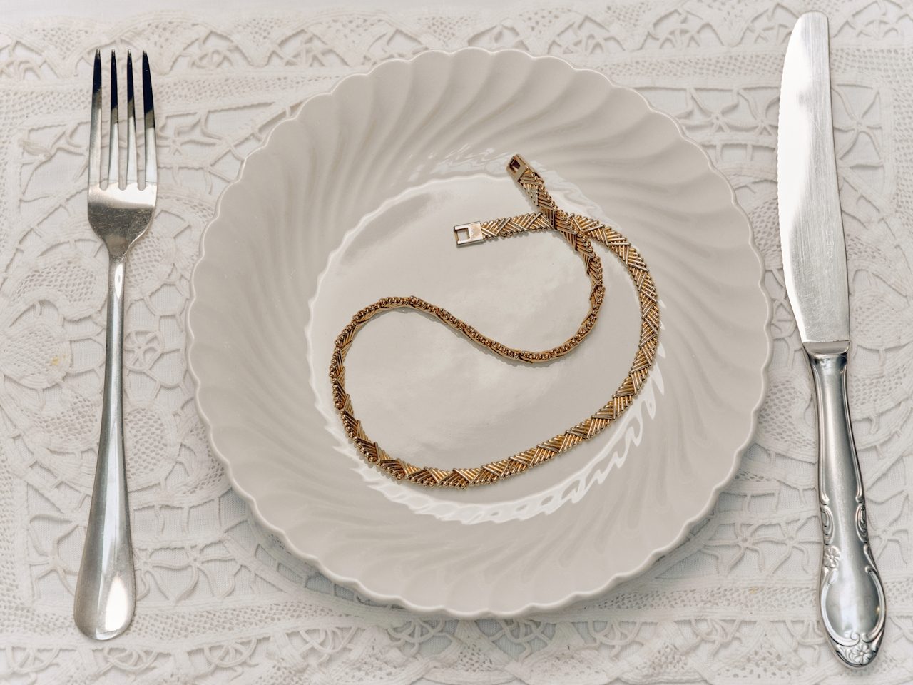 Pearls and gold on fine china