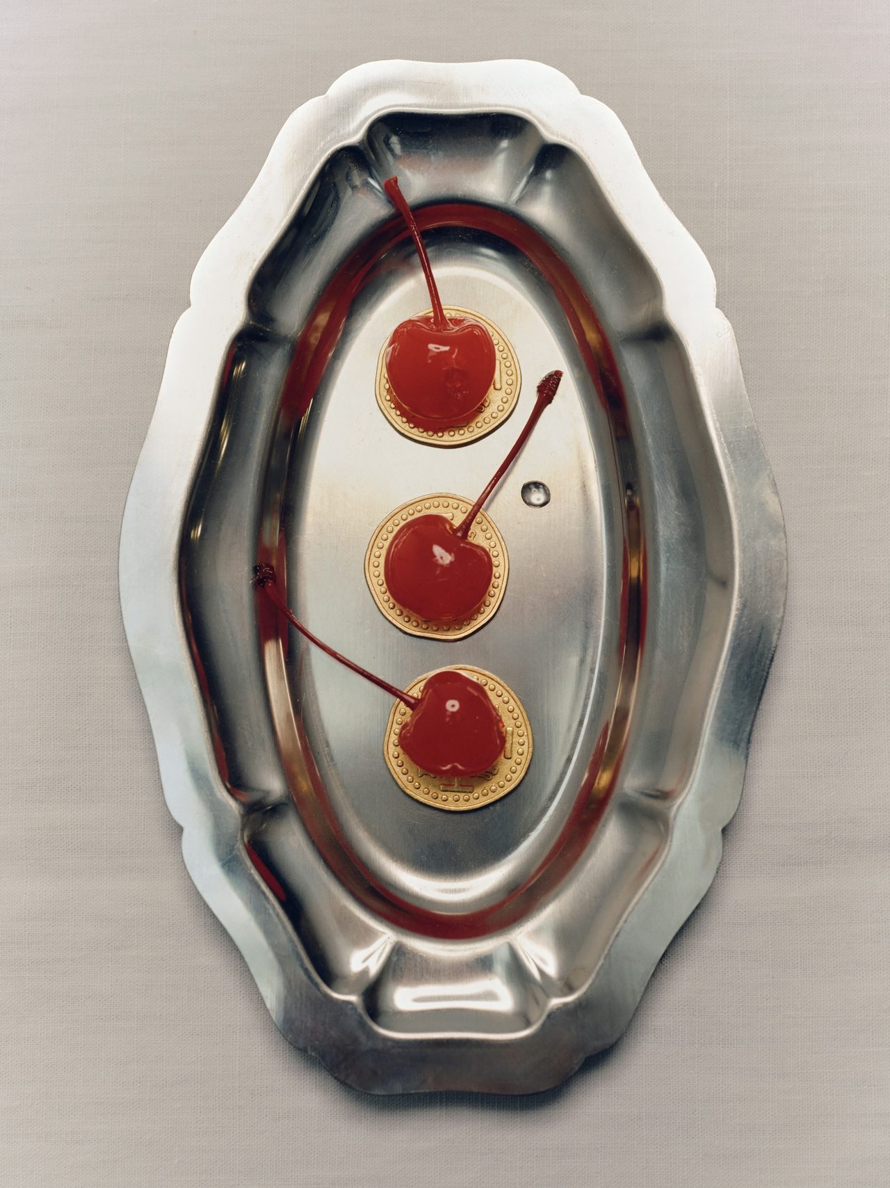 Cherry tarts on silver tray